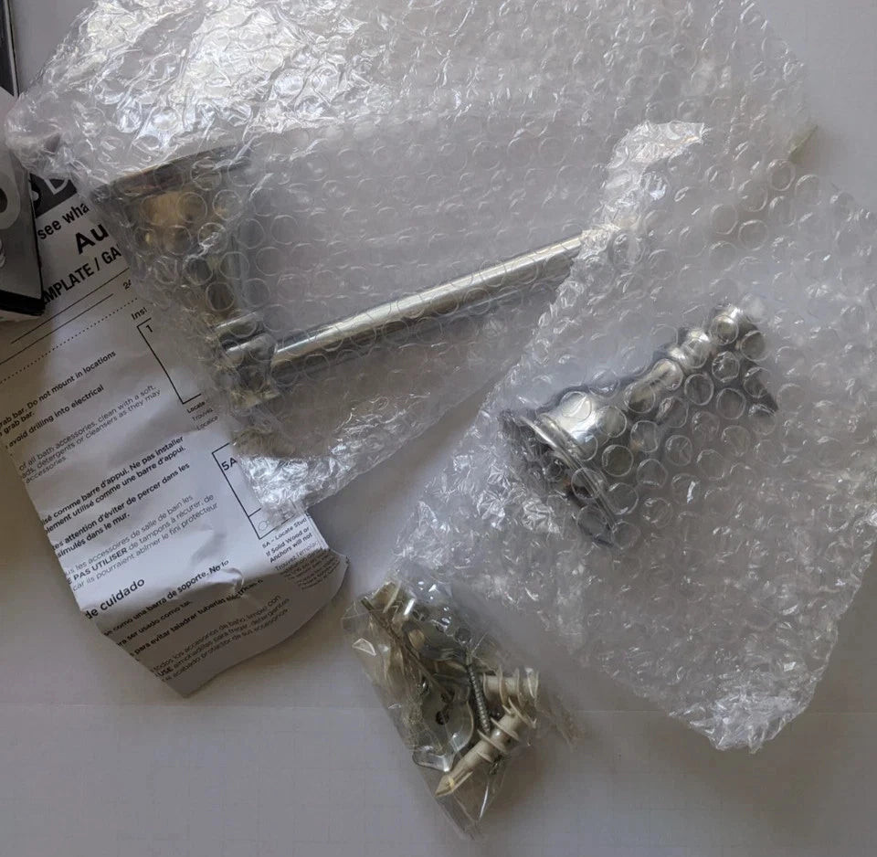 Delta Aubrey Pivot Arm Toilet Paper Holder AUB50-PC NOB